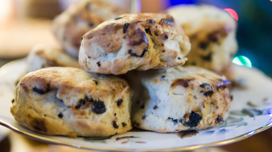 Currant scones piled on a plate