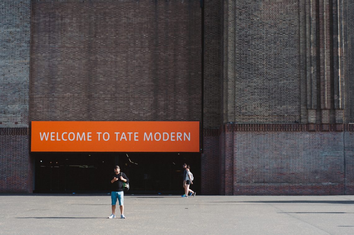 Man in front of the Tate Modern entrance