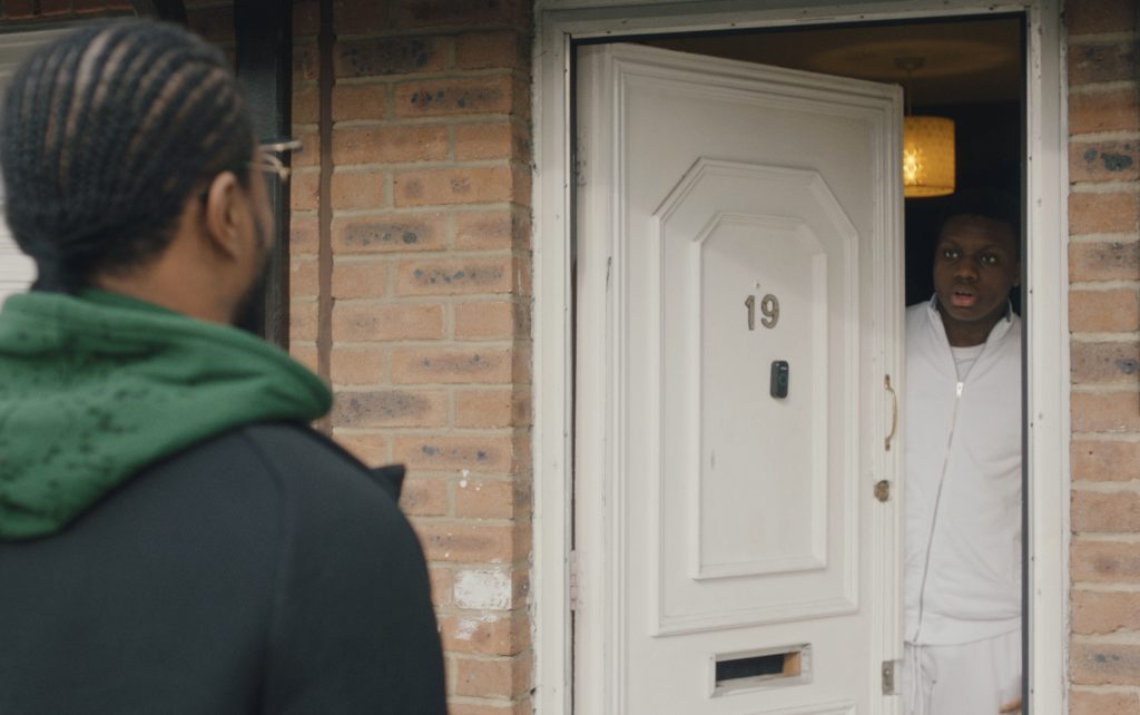 Patrice Evra surprising a young carer at his door