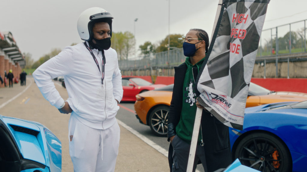 Patrice Evra and young carer at Brands Hatch for a supercar day